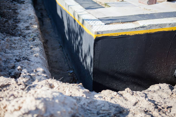 Professional Waterproofing technician working in Catlett, VA